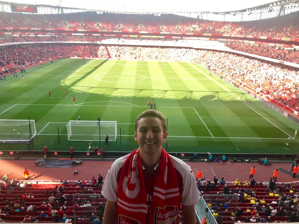 In an Arsenal scarf high in the stands before my first Arsenal game, against Watford